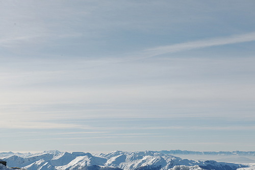 mountain view winter landscape with fresh snow,  minimalistic scene at beautiful sunny day