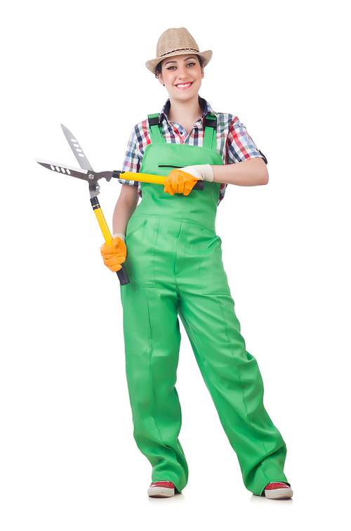 Young woman with shears on white