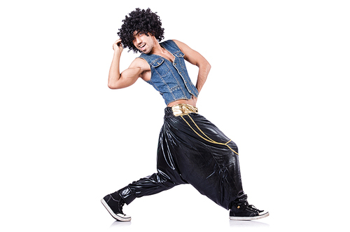 Rap dancer in wide pants on white