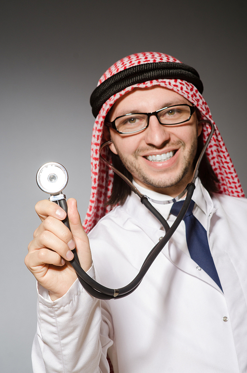 Funny arab doctor with stethoscope