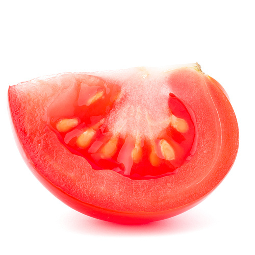 Tomato vegetable slice isolated on white cutout
