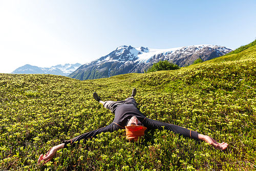 Relaxing backpacker  in mountains.