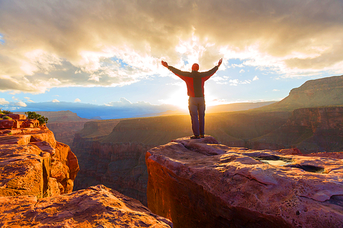 Happy man in mountains. Instagram filter.