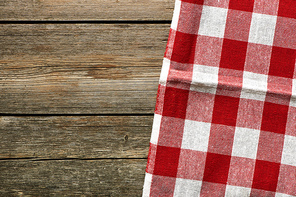 Red tablecloth on rustic background