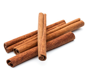 cinnamon stick spice isolated on white closeup