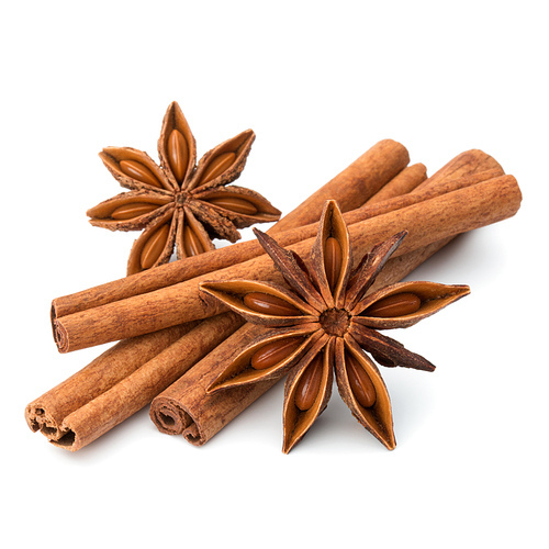 cinnamon stick and star anise spice isolated on white closeup