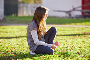 Tween kid girl profile in the park at sunset side view