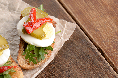 Open egg sandwiches rustic style serving