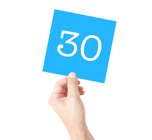 30 written on a card held by a hand