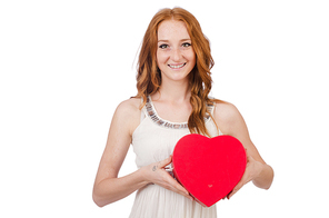 Woman with gift box isolated on the white