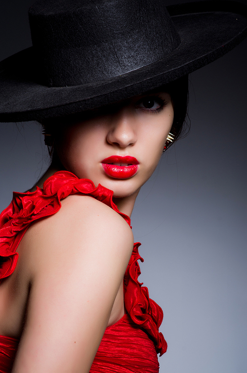 Attractive girl in red dress