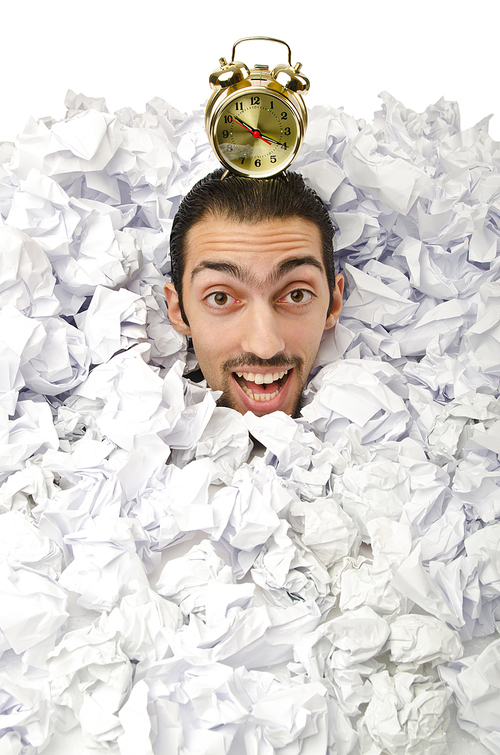 Man with lots of waste paper