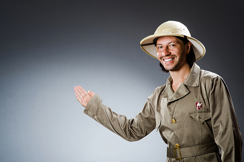 Funny safari hunter against background