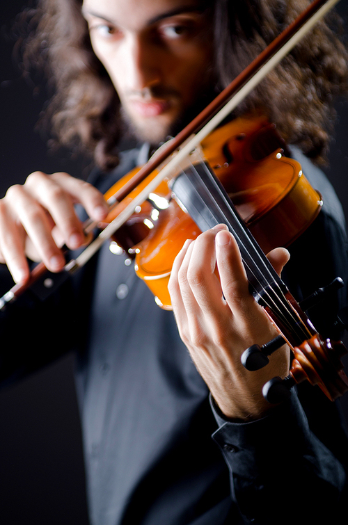 Violin player playing the intstrument