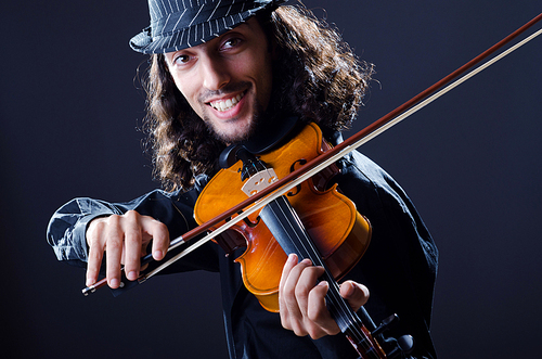 Gypsy violin player in studio