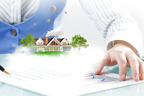 Close view of businesswoman signing construction project documents