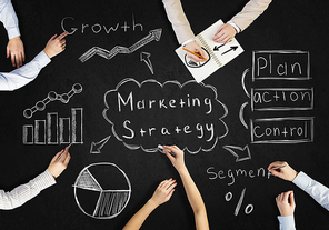 Top view of people hands drawing business teamwork strategy