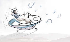 Funny image of woman flying in drawn spaceship