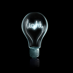Glass bulb with word light on black bakground