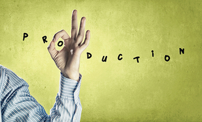 Word production on color background and ok gesture
