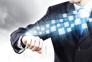 Businessman looking at wristwatch. Media technologies and innovations
