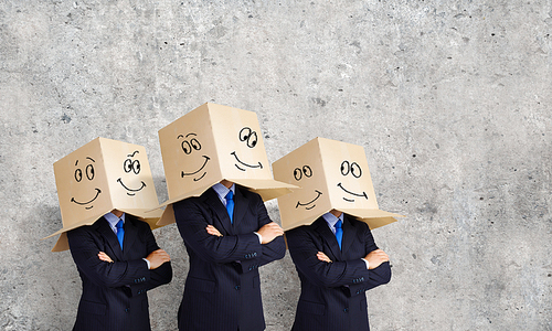 Unrecognizable business people wearing carton boxes on head