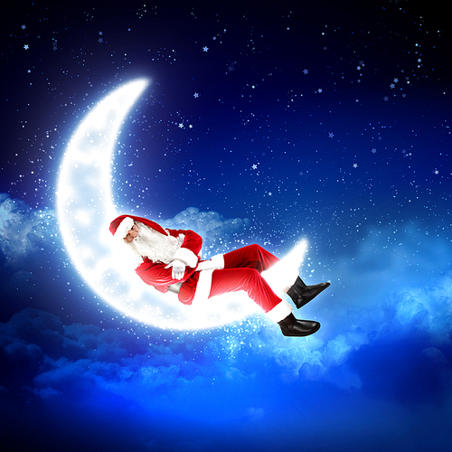 Photo of Santa Claus sitting on shiny moon above winter forest