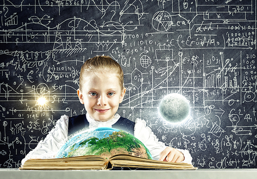 Schoolgirl at lesson with opened book against sketch background. Elements of this image are furnished by NASA