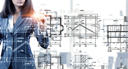 Female architect working with virtual construction plan