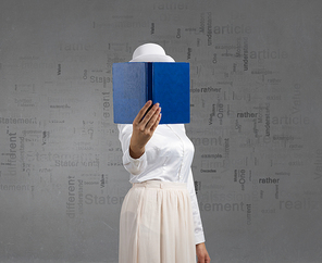Woman in white with opened book against her face