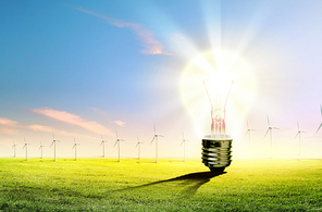 Image of light bulb against nature background. Ecological concept