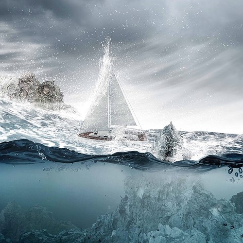 Submerged ocean view with yacht floating above