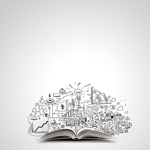 Opened book with business sketches over white background