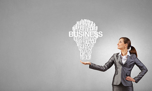 Businesswoman holding in hands successful idea concept