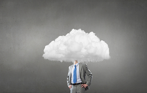 Young businessman with white cloud instead of head