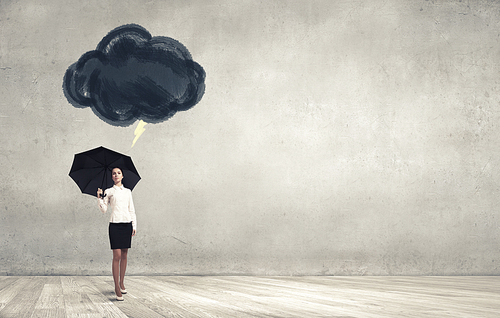 Bad luck and crisis concept with young businesswoman with black umbrella