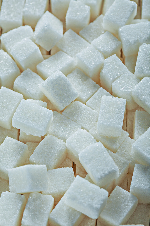 White sugar cubes top view.