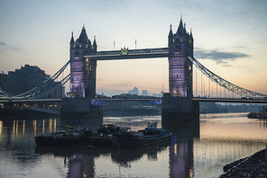 Stunning Autumn Fall sunrise over Tower Bridge and River Thames in London.