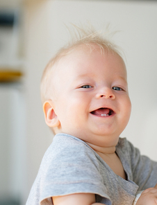 Baby boy with blue eyes portrait