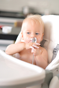 Feeding baby with a spoon