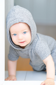 Baby boy with blue eyes portrait