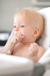 Feeding baby with a spoon