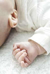 Close Up Of Slepping Baby Girl's Hand