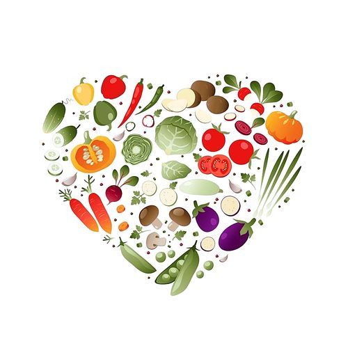 Vegetables in shape of heart on white background