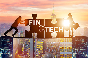 Fintech financial technology concept with puzzle pieces