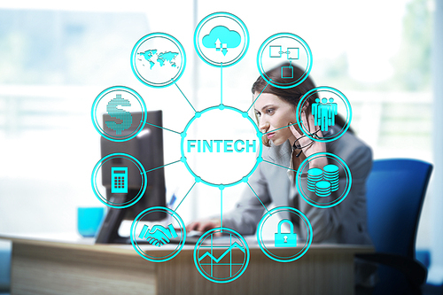 Businesswoman with computer in financial technology fintech concept