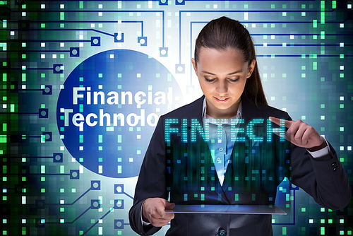 Businesswoman with tablet in financial technology fintech concept