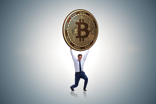 Businessman holding bitcoin in cryptocurrency blockchain concept