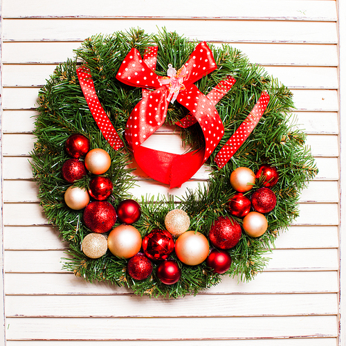 Christmas holiday wreath with red and gold balls