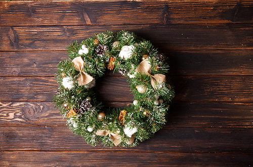 Burlap rustic Christmas wreath with bows and cotton flowers